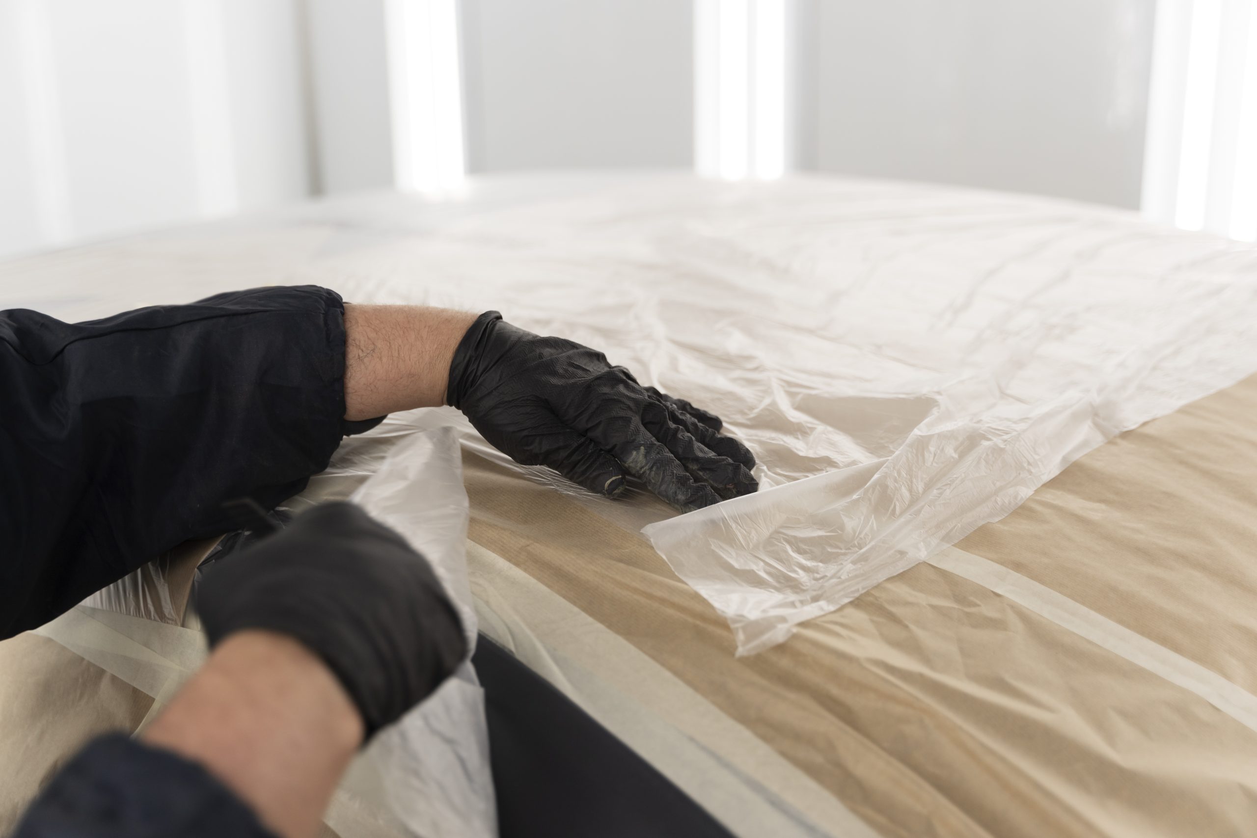 service worker painting car auto service scaled